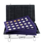 Aluminium coin case containing a quantity of World (some silver) coins mainly from circulation in
