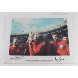 World Cup 1966 - a 17"x19" colour picture of Bobby Moore kissing the World Cup Trophy on lap of