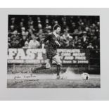 Footballer David Fairclough 'super sub', signed silver gelatin photo, running on flooded pitch at