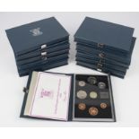 GB Proof Sets (11) 1983, 84, 85, 86, 87 x2, 88, 89, 90, 97 & 1999. aFDC - FDC in the blue cases of