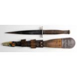Fairbairn Sykes 3rd pattern Commando dagger, cross guard stamped 2 / 45 and Crows Foot "S" shows use