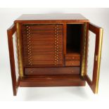 Large glazed 30-tray (plus other compartments) mahogany coin cabinet by Nichols, with key, housing a