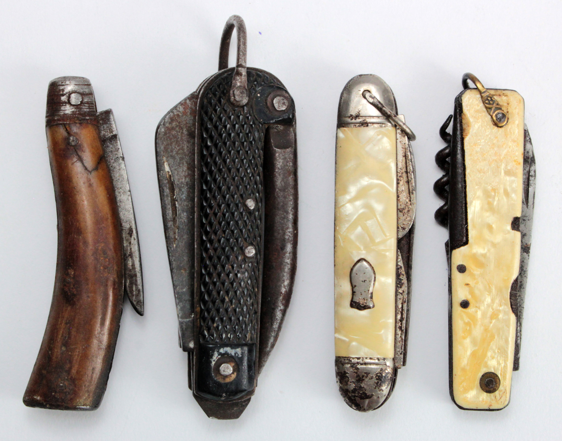 Collection of various pocket knives some military