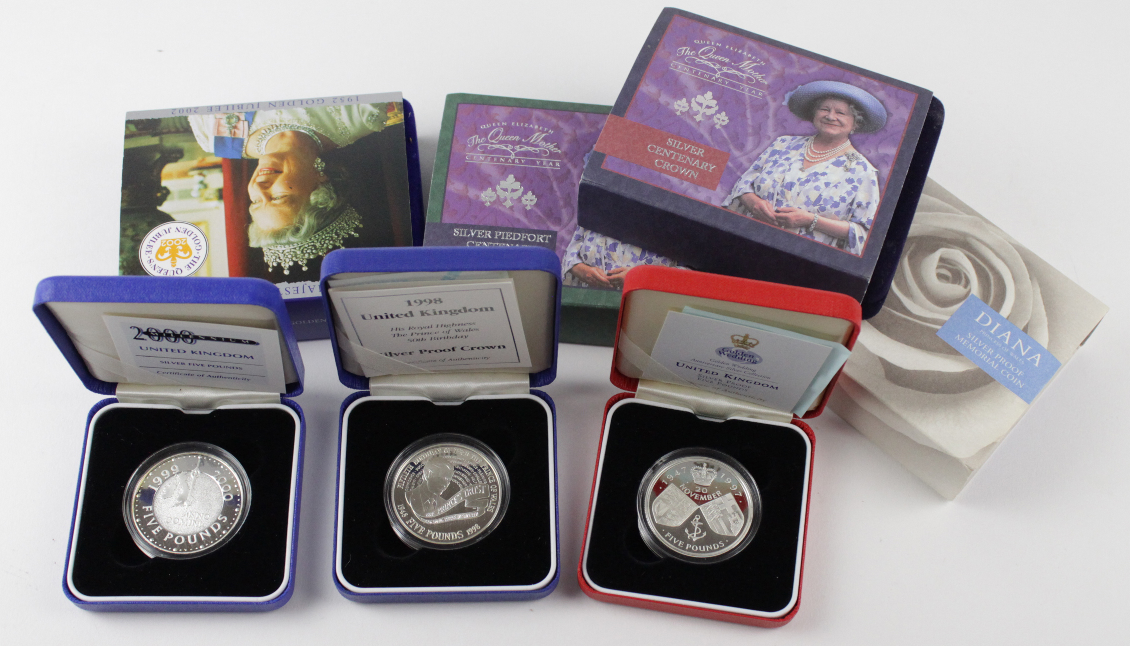 GB Silver Proof Crowns / £5s (9) 1997, 98, 1999 "Diana", 1999 "Millennium", 1999 / 2000 "Millennium"