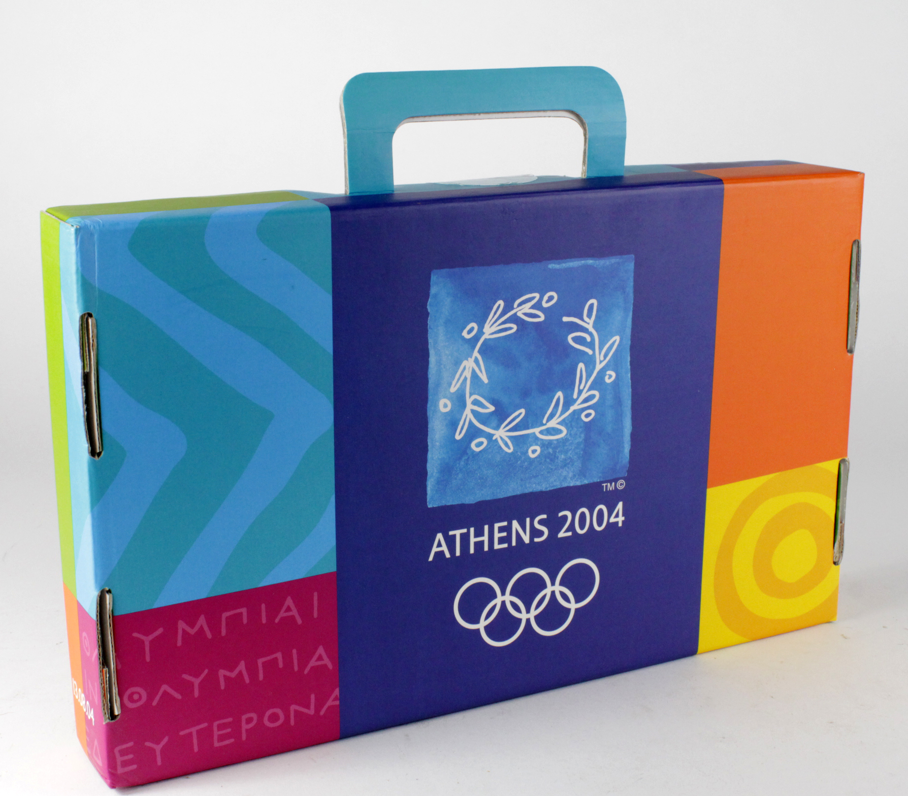 Olympics Athens 2004 Giftbox placed on some seats for the Opening Ceremony, coloured cardboard style