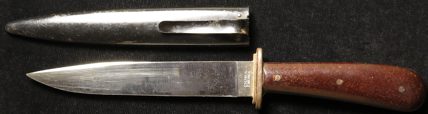 German Boot Knife, with unusual plain grips. Blade maker marked 'Puma Solingen'. With metal