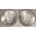 USA Morgan Silver Dollar 1882-CC, UNC with some bag marks, in an ersatz slab (MS66)
