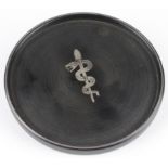 Swedish circular bakelite dish by Perstorp, with silver decoration depicting a snake wrapped