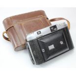 Ross Ensign Autorange 820 folding camera, with Ross 105mm XPRES f/3.8 lens, no. 75678, contained