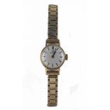 Ladies 9ct cased Omega wristwatch circa 1972. The silvered 18mm dial with gilt baton markers. On a