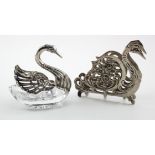 Two swan related items, one is marked for 800 silver and the other, a silver mounted salt, bears