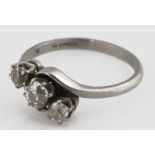 Platininum three stone diamond ring, the central stone (approx .45ct) flanked by two smaller