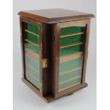 Oak four sided rotating thimble display case, height 41.5cm approx.