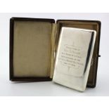 Very large silver boxed cigarette case. Reads on the front "Presented to Rev. E. Peake as a token of