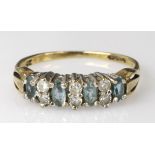 9ct yellow gold blue topaz and cz half eternity ring, finger size N, weight 1.9g