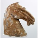 Chinese Han Dynasty Terracotta Horse Head. C, 221-206 BC. A grey terracotta with traces of white
