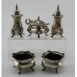 Silver cruet set of five items comprising two salts , mustard pot, two peppers and three blue