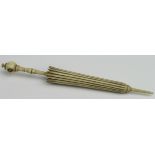 Bone stanhope needle case in the form of an umbrella, with a scene of Blenhiem Palace, length 10.5cm