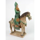 Chinese Ming Dynasty Horse and Rider . C, 17th century AD. Green glazed terracotta , intact