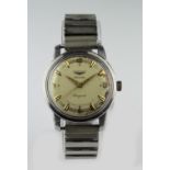 Gents stainless steel cased Longines Conquest automatic wristwatch, some slight discoloration to the