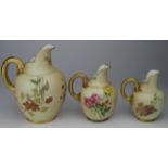 Royal Worcester three blush ivory jugs with handles (of varying sizes), floral decoration, (no.