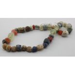 Viking Stone and Glass Necklace, ca. 900 - 1100 AD. Nicely coloured beads; modern string -