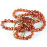 Amber type bead necklace, consisting of two rows of beads, each row measures 40cm approx.