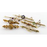 Seven 14/15ct bar brooches, total weight approx 21.5g