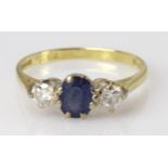 18ct yellow gold sapphire and diamond three stone ring, finger size N, weight 2.5g