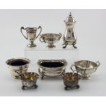 Mixed lot of seven silver cruet items and one small silver prize cup including two small silver