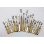 Eighteen silver & white metal pickle forks, with bone, mother of pearl, etc. handles, mostly