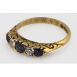 18ct gold sapphire and diamond ring, the three sapphires interspaced by two old cut diamonds