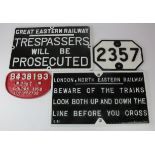 Railway interest. A collection of four cast iron railway signs / plaques, comprising 'London North