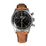 Gents chronograph wristwatch. The black dial signed Saturne Deluxe with baton markers and two