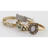 Four 9ct gold paste and cz set rings, weight 11.5g