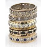 Five 9ct / yellow metal eternity rings, total weight 16.4g