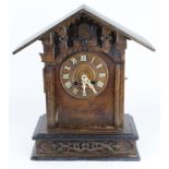 Large oak cased cuckoo mantle clock, ornately carved, cuckoo working at time of cataloging