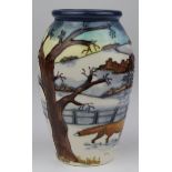 Moorcroft small vase, depicting a snowy country scene with two foxes, printed and painted marks to