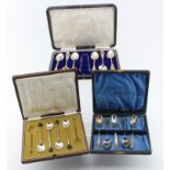 Mixed lot of boxed silver & silver plated flatware comprising four silver bean topped coffee spoons,
