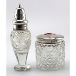 Two silver mounted glass items comprising a sugar caster with silver top hallmarked A.C. London 1901