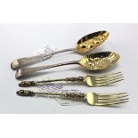 Two ornately decorated silver forks & two silver fruit spoons, one spoon hallmarked 'Paul Crespin,