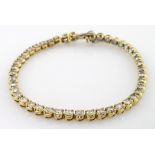 18ct gold tennis bracelet set with 43 diamonds, with fold-over safety clasp, approx 4ct diamonds,