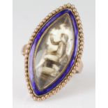 Rose gold marquise shaped dress ring set with painted bone picture with blue enamel surround, finger