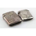 Two silver vesta cases both engraved. Hallmarked for Birmingham 1901 and Chester 1911