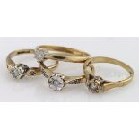 Four 9ct yellow gold diamond solitaire rings, weight 8.1g