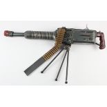 Japanese tinplate battery operated machine gun by Nomura, on tripod stand, length 62cm approx. (