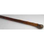 Walking Cane. Japanese bamboo walking cane with natural root knop, shaft extensively carved with