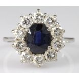 18ct white gold sapphire and diamond oval cluster ring, finger size L, weight 3.3g