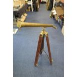 Brass telescope by Ross London, on a wooden tripod stand, telescope length 98cm approx.