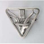 Silver Georg Jensen triangular brooch (no. 257), depicting a dolphin & bulrushes, makers marks